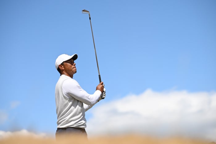 Tiger Woods plays on the final hole.