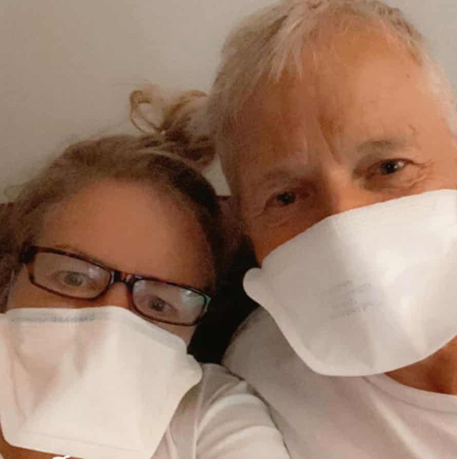 two people wearing face masks