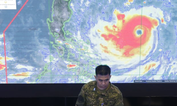 A member of the Philippine air force briefs president Duterte at the national disaster centre in Manila on Thursday.