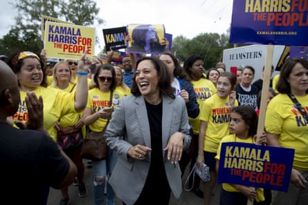 Kamala Harris marches with supporters in Des Moines, Iowa, on 21 September.