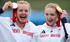 Silver medalist Hope Gordon (left) and gold medalist Charlotte Henshaw celebrate on the podium