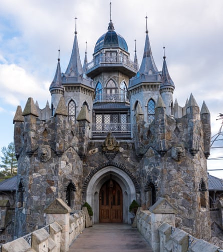 A photograph of the front of an over-the-top Disney-style castle
