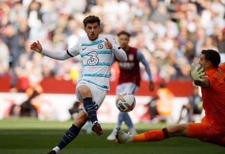 Mason Mount beats Martinez after an error by Tyrone Mings.