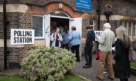Voters queue to enter a polling station at Trinity Church in Golders Green on June 23, 2016 in London, England.