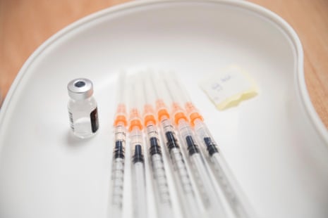 Syringes filled with Pfizer-BioNTech vaccine against the coronavirus.