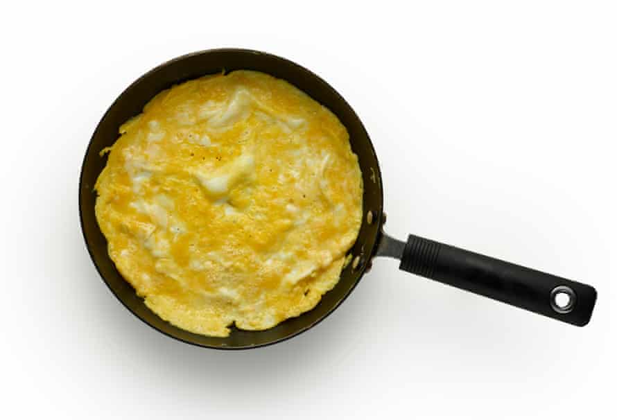 Felicity Cloake's Master Class - Omelet Arnold Bennett 6. Fire up the grill.  In a medium omelet pan (or all in a large skillet if making an omelet for sharing), whisk the four remaining eggs with some seasoning and half the remaining butter over medium-high heat.  When the foam subsides, pour in half the eggs (or all if you're making a large one) and shake the pan to coat the bottom.