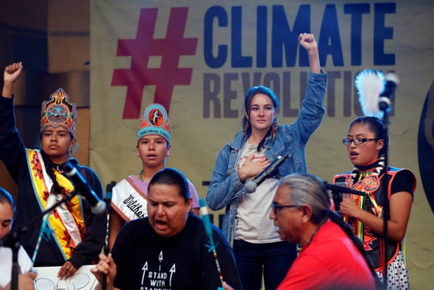Actor Shailene Woodley stands with Native Americans during a climate change rally in solidarity with protests of the pipeline in North Dakota.