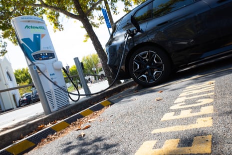 An electric car is seen recharging at an ActewAGL charging station in Canberra