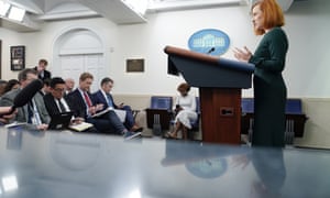 White House press secretary Jen Psaki speaks during a press briefing at the White House, today, while, seated to her right wearing white, principal deputy press secretary Karine Jean-Pierre also attends.