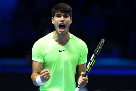 Carlos Alcaraz of Spain celebrates winning the first set.
