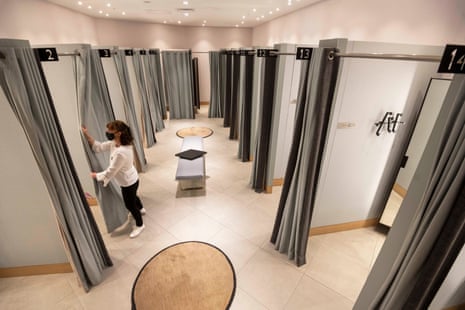 John Lewis staff getting fitting rooms ready at their White City store ahead of reopening on April 12. A host of retailers have confirmed reopening plans for next Monday as shoppers look forward to a return to bricks and mortar shopping after more than three months.