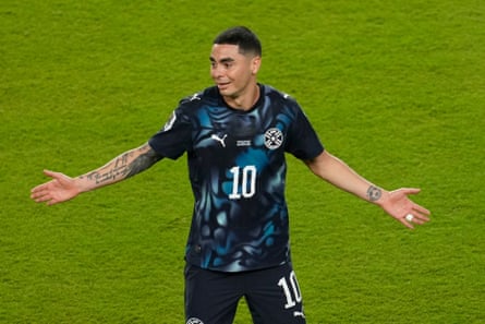 Paraguay's Miguel Almirón reacts after he received a red card against Turkey.