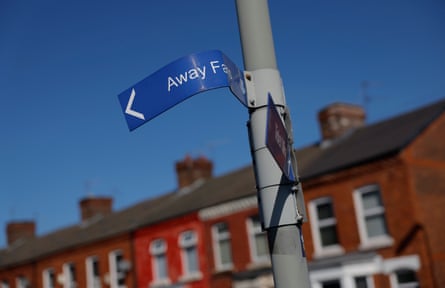 The bent double sign indicating the direction that away fans should go before the Premier League match between Everton and Arsenal at Goodison Park.