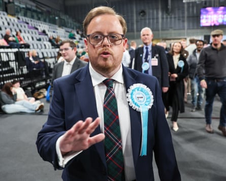 Reform's Thomas Kerr wearing a Reform rosette on the night of the elections