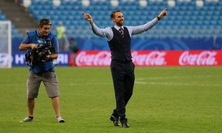 Gareth Southgate conducts England supporters after his side’s 2-0 victory over Sweden.