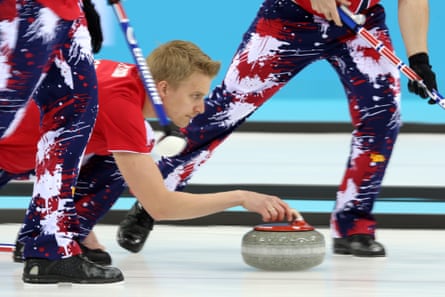 Vad Haavard Petersson of Norway delivers a stone during the tie-breaker match between Norway and Great Britain