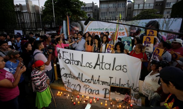 Demonstrators gather outside a court after the trial of the men charged with the murder of indigenous environmental activist Berta Cáceres, in Tegucigalpa.