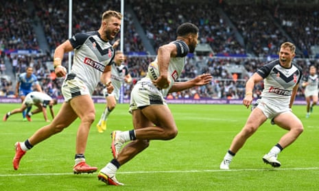 Kallum Watkins of England scores their fourth try.