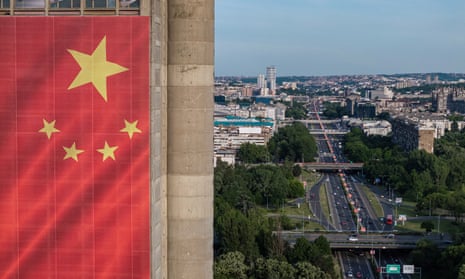 A Chinese flag hangs from a building before President Xi Jinping’s visit in Belgrade, Serbia.