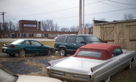 Old cars parked across the street from the Foxconn office in Harrisburg, Pennsylvania, in 2017. Foxconn said it would build a $30m factory here in 2013, but it never happened.