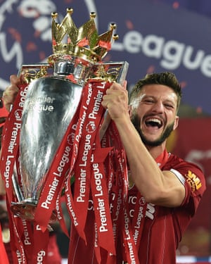 Adam Lallana with the Premier League trophy on 22 July
