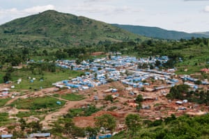 An aerial view of an artisanal mining complex in Uganda. The mining area is seen in the foreground.