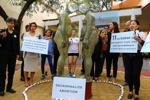 Women’s rights advocates in the Philippines protest against abortion laws