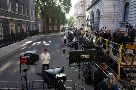 Members of the media in Downing Street this morning.