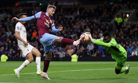 Burnley's Jacob Bruun Larsen of Burnley has a shot saved by André Onana of Manchester United.