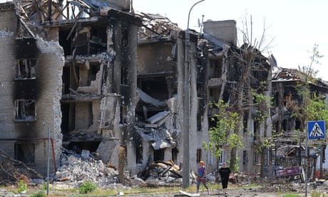 Homes in Sievierodonetsk destroyed in the Russian capture of the city. The Kremlin’s envoy to North Korea said Pyongyang could send workers to rebuild Donbas.