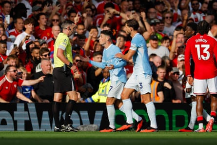 Phil Foden remonstrates with Michael Oliver.
