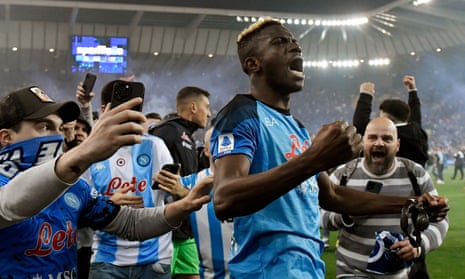 Victor Osimhen celebrates after Napoli’s 1-1 draw at Udinese made them champions of Italy