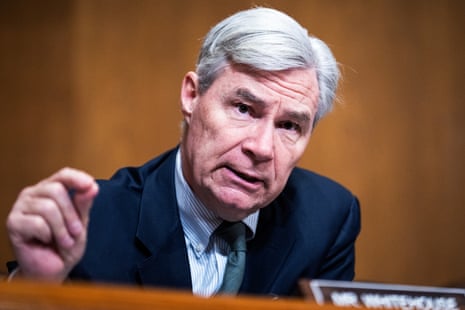 a man in a suit speaks