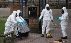 British Army officers remove the bench,where Sergei Skripal and his daughter, Yulia, were found in Salisbury.