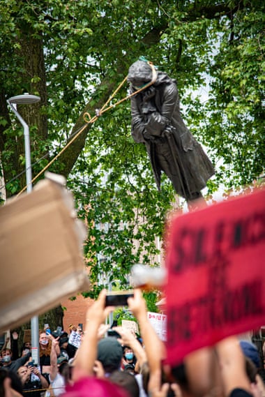 A statue of Edward Colston in Bristol is toppled during Black Lives Matter protests in 2020