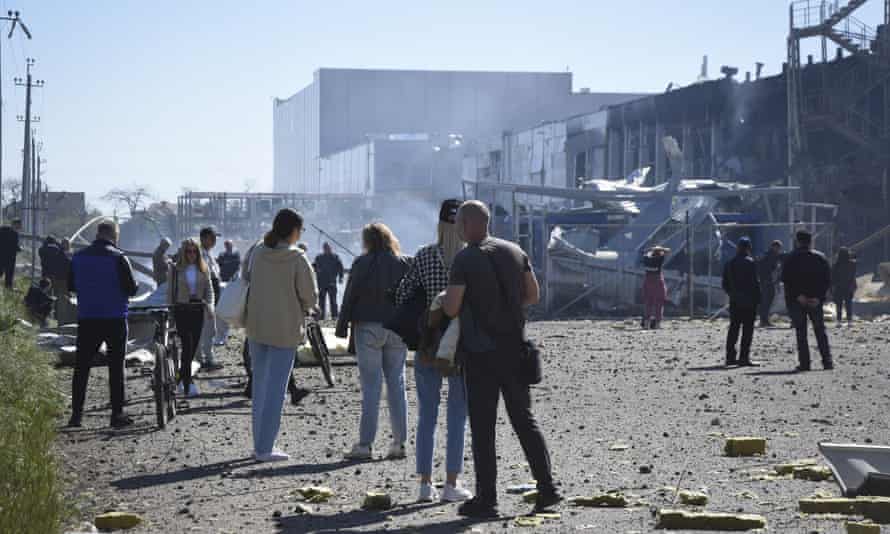 Russia-Ukraine war: Putin preparing for prolonged war and will turn to more drastic measures to achieve aims, says US – live | Ukraine 8 People stand near a destroyed building on the outskirts of Odesa, Ukraine, Tuesday, May 10, 2022.