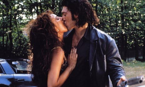 Monica Belluci and Vincent Cassel kiss in Dobermann