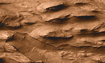 This picture (detail shown), released by Nasa in 2000, was the first to hint at layered sedimentary rock on Mars