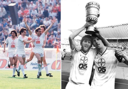 Horst Feilzer (right) celebrates after scoring Uerdingen’s equaliser against Bayern Munich (left), Friedhelm (left) and Wolfgang Funkel celebrate with the cup after Uerdingen’s 2-1 victory.