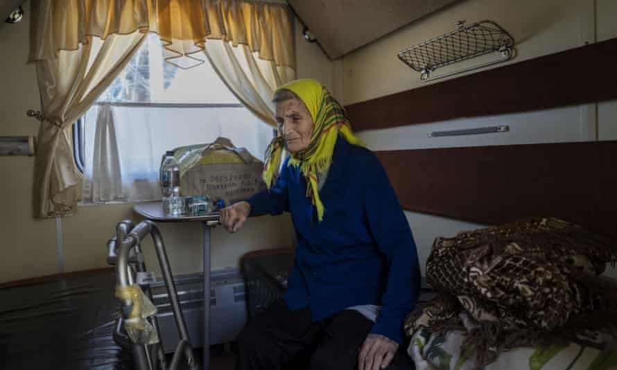 An elderly woman who has been evacuated from the Lysychansk area sit in an evacuation train in Pokrovsk in eastern Ukraine.