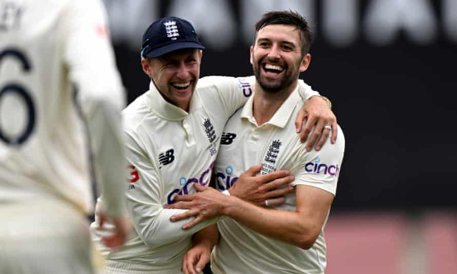 Mark Wood (right) took six for 37 in the final Ashes Test in Tasmania, but said it was tough to see Joe Root suffer.