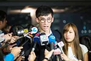 Sixtus ‘Baggio’ Leung and Yau Wai-ching speak to the press about efforts by the Hong Kong government to bar them from taking the legislative council oath again.