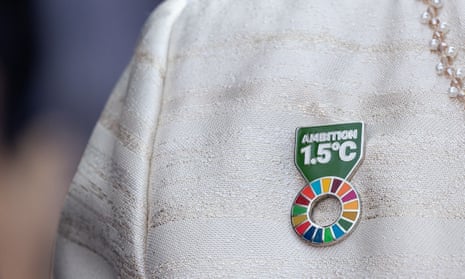 A UN Sustainable Development Goals brooch worn by Lady Patricia Scotland on 22 June 2022 in Kigali, Rwanda. 