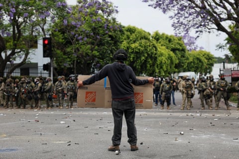 a man in front of a line of people
