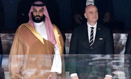 FILE - Saudi Arabia Crown Prince Mohammed bin Salman, left, and FIFA President Gianni Infantino, stand for the anthem prior to opening soccer match of the 2018 World Cup between Russia and Saudi Arabia at the Luzhniki stadium in Moscow, Russia, on June 14, 2018. (Alexei Nikolsky/Sputnik, Kremlin Pool Photo via AP, File)