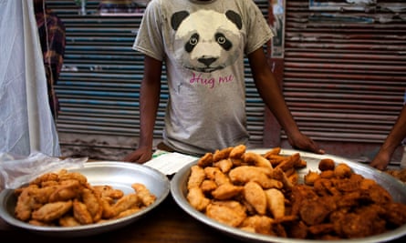 A temporary food stall is seen in a street in Old Dhaka, Bangladesh