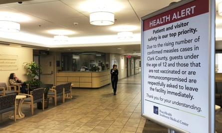 A sign prohibiting all children under 12 and unvaccinated adults at the entrance to PeaceHealth Southwest Medical Center in Vancouver, Washington.