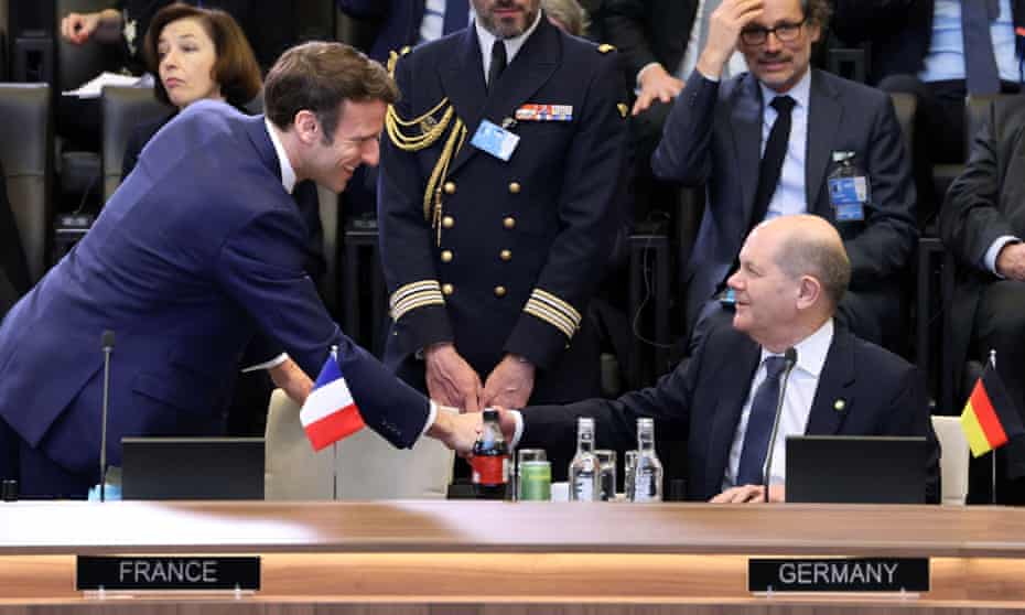 Emmanuel Macron and Olaf Scholz at a Nato summit in Brussels, 24 March 2022.