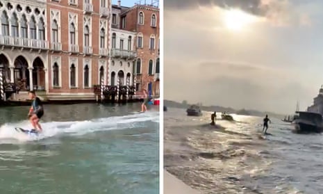 People foil surfing along Grand Canal