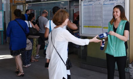 Rail passengers in Paris are given bottled water